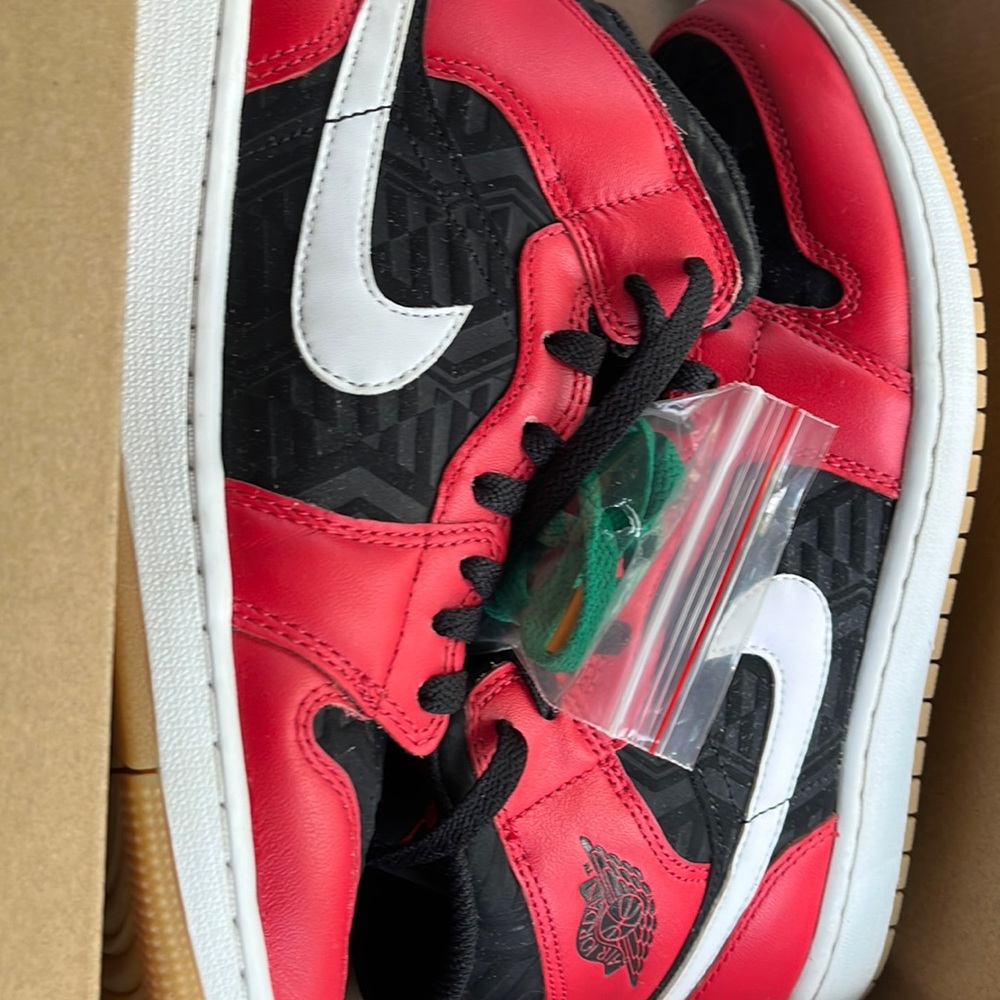 size 10 air force Jordan’s red and black black and green strings